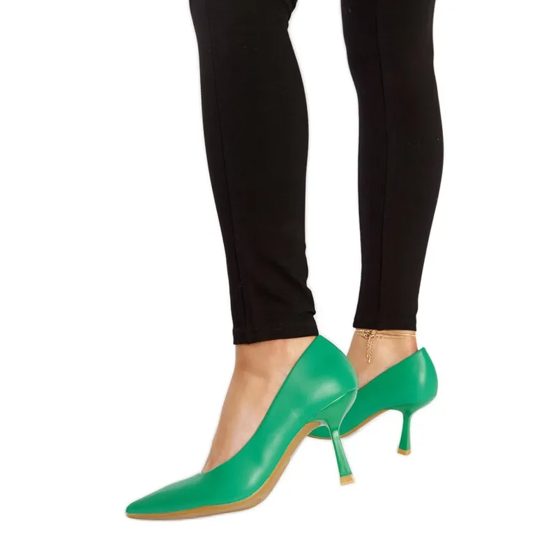 Green low-heeled Nixon stilettos