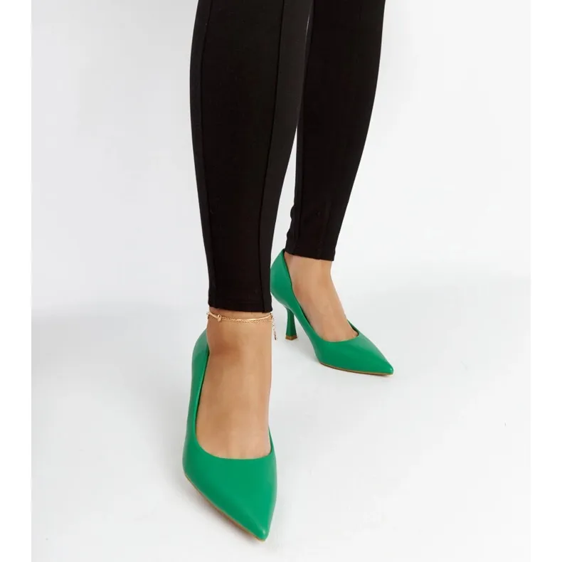 Green low-heeled Nixon stilettos