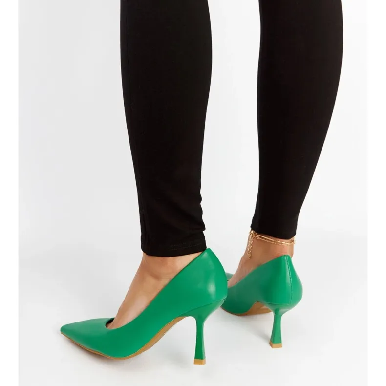 Green low-heeled Nixon stilettos