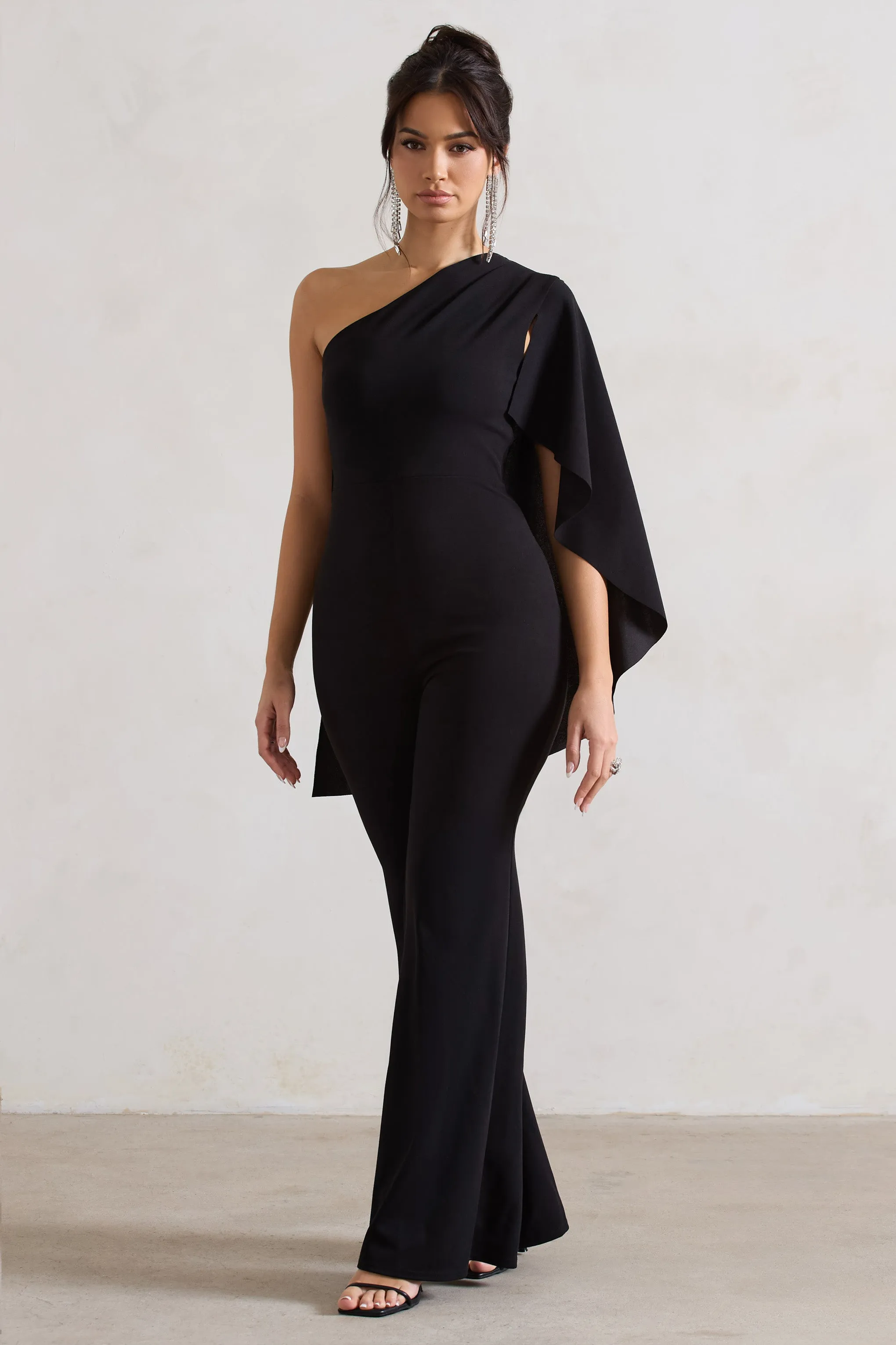 Pristine | Black One Shoulder Cape Sleeve Flared-Leg Jumpsuit