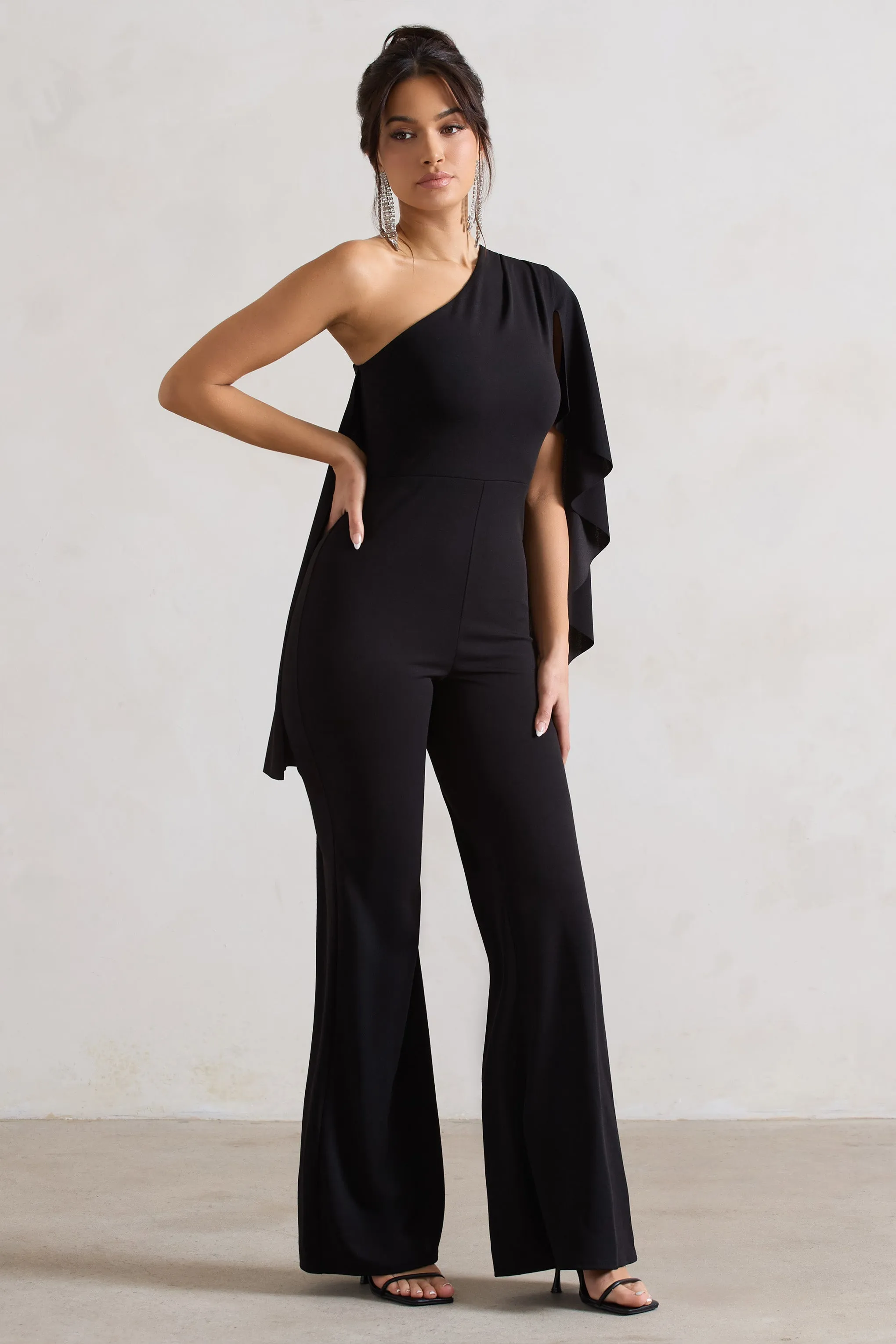 Pristine | Black One Shoulder Cape Sleeve Flared-Leg Jumpsuit