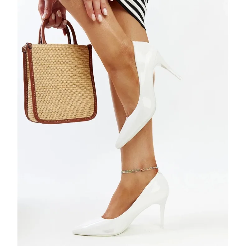 White patent stilettos with Alsacea leather insert